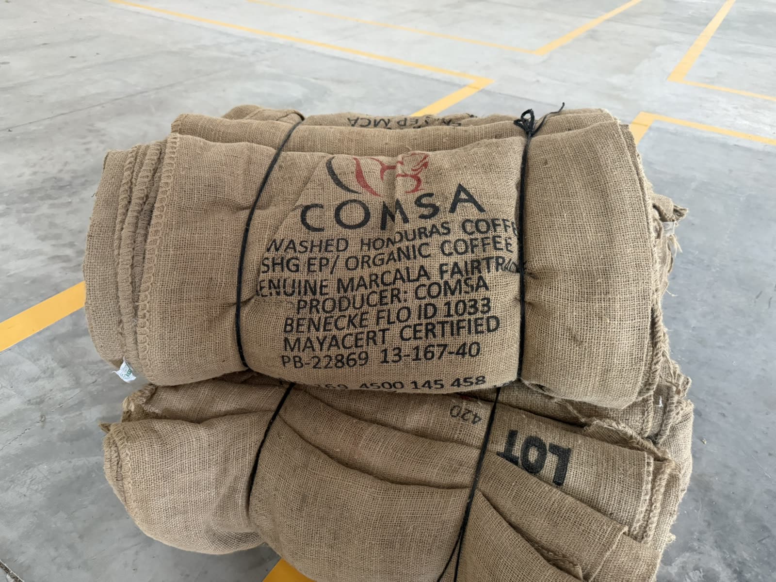 Export sacks of green coffee ready for onward movement.